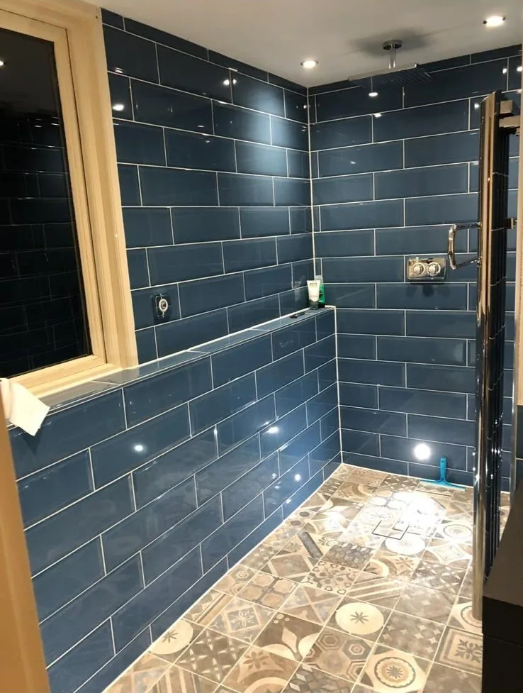 Navy metro tiled shower enclosure